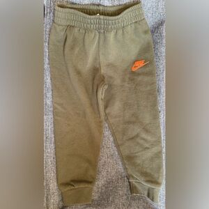 Nike Kids Olive Green Joggers with Orange Logo